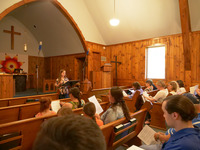 Photograph of a recording session featuring a large group of participants, at the Church of the Wilderness, Bowler, Wisconsin, in June 2018.
