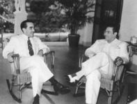 President Miguel Mariano Gómez and Batista in a rare photo, taken sometime in 1936, in which both men are smiling. By the end of the year, Batista would ensure President Gómez's impeachment.