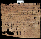 Large papyrus containing a letter in Coptic and writing exercises in Coptic and Arabic.