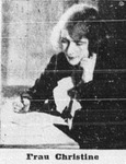 A woman talking on the telephone.