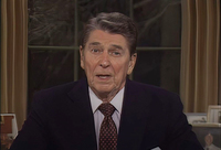 Image of President Reagan addressing the viewers with eye contact, mid-speech.