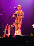 Taylor Mac with a shaved head and white face paint and wearing a nude bodysuit in the marathon production of A 24-­Decade History of Popular Music in Brooklyn, New York.