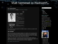 A screengrab from the webpage titled "What Happened in Piedmont?" On the main part of the page (dominating the left 3/4ths) there is a blog-like post titled "Dr. Jeremy Stone." Beneath this title there is a line of text that reads "May 21st, 2008 10:33pm by Andrew / 8 comments / Trackback." There is then an image showing a picture of the fictional Dr. Jeremy Stone, several lines of official-looking text, a set of fingerprints, and a signature. Beneath this image are several lines of text that read: "Found another new access code for the Wildfire intranet... and this one unlocks the file on Dr. Stone himself: Jest or Enemy. Most of this information was already available on the website, but it's interesting all the same. It's also interesting that the government knew all about the ill will between Stone and Keene, though I'm not sure why they'd make a specific note of that in the Wildfire files. Unless, of course, Keene is also involved in this somehow. Based on this access code, it also seems clear that the personnel files, at least, are protected with anagrams... so the next thing is to figure out possible access codes for the file on Tsi Chou, the only remaining scientist on the team. Suggestions? Tags: wildfire, access codes, stone." The final 1/4th of the screen includes links to pages "Home, About Me, Access Codes," a section that reads " What's Going On? The government quarantined the town of Piedmont, UT in order to contain a deadly aliened virus codenamed Andromeda. The virus was stopped, but not before claiming a lot of lives. To read the short version of what happened, start here," an "email me" button, and links to various facebook accounts.