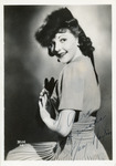 Black-and-white photograph of Mary Martin seated and looking at the camera.