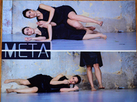 At the top are two female dancers lying sideways on top of one another with their legs bent. The word META is positioned in the middle, and a line cuts the image in half. The bottom half shows one dancer lying on their side with fists clenched; another dancer’s legs are visible to the right.