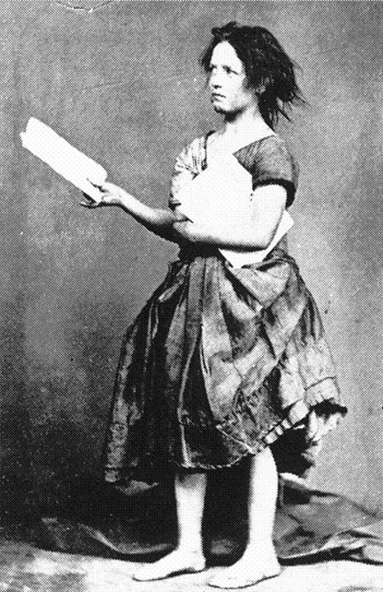 Florence Holder posed as a newspaper seller in the streets (June 1874).