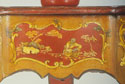 The decorative chinoiserie panel was painted with the red and yellow colored varnishes typical of the period. Green and blue varnishes were also fashionable.