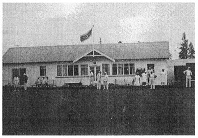 Opening day of the season at the South Downs bowling club. It is usual for club members to wear white on special occasions such as this. The women will later serve tea in the clubhouse.
