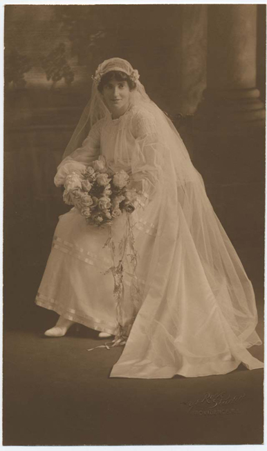 Edna Maine Spooner's wedding dress is an example of the creative possibilities of home sewing. In addition to changing the sleeves, she added a train, a sash and ribbons.