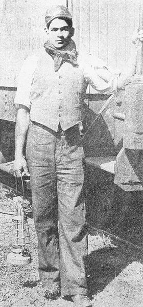 Batista as a railroad brakeman, probably around 1919, which would make him about eighteen years old in this photo. He later was seriously injured and nearly killed working on the railroad.
