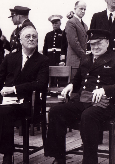 Roosevelt and Churchill at the Atlantic Conference. Welles, always suspicious of the British Prime Minister, looks on with concern. Franklin D. Roosevelt Library.